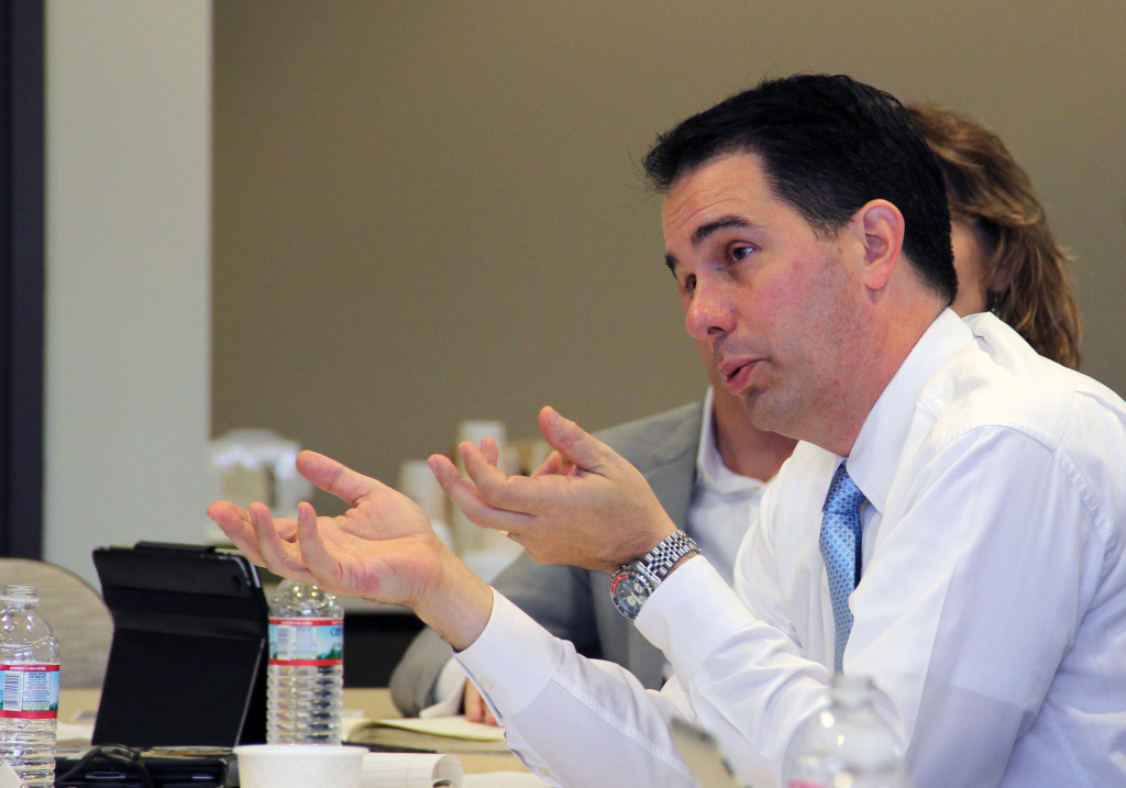Wisconsin Governor Scott Walker speaks at a roundtable on entrepreneurship today at University Research Park in Madison, Wis.
